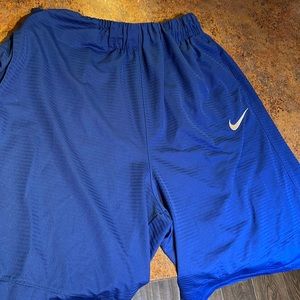 Blue Nike shorts